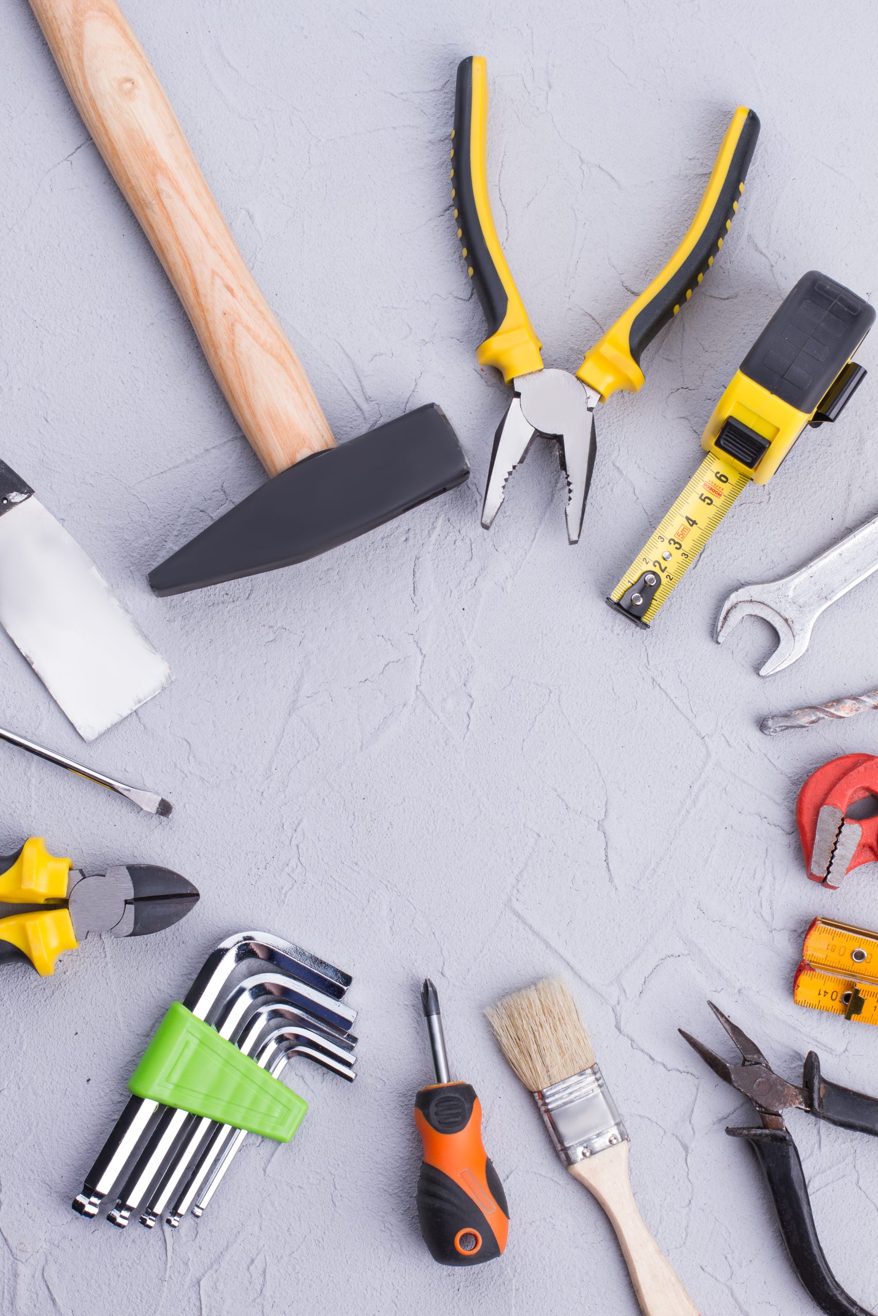 Set of house improvement tools, top view. Frame from repair instruments. Construction, repair concept. Builder Base - Your Trusted Builder in Newport, Cardiff & Surrounding Areas